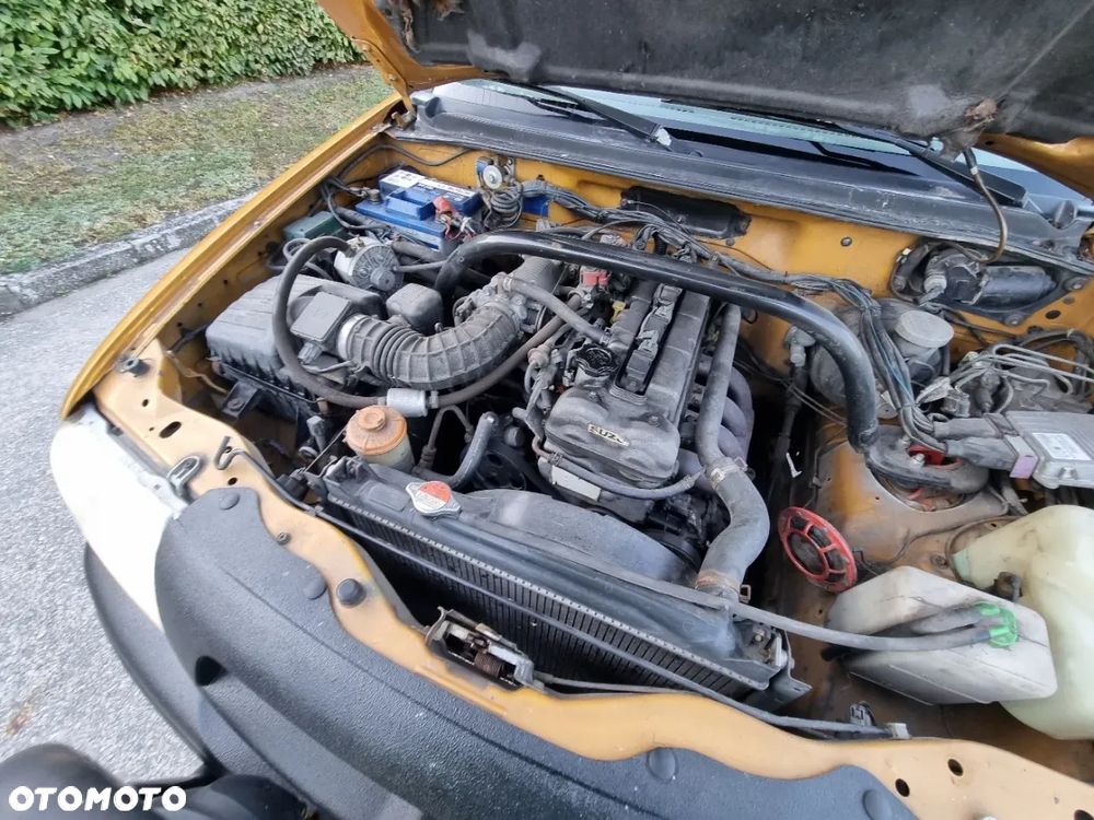 Suzuki Grand Vitara 2.0 - 14