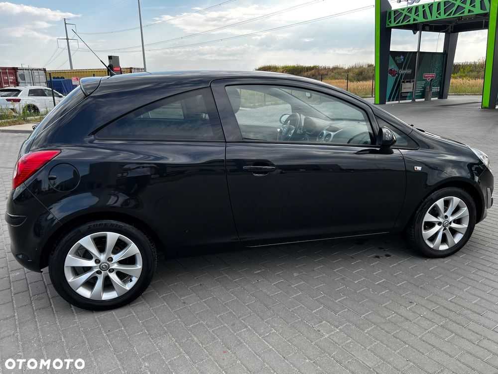 Opel Corsa 1.4 16V Cosmo - 9