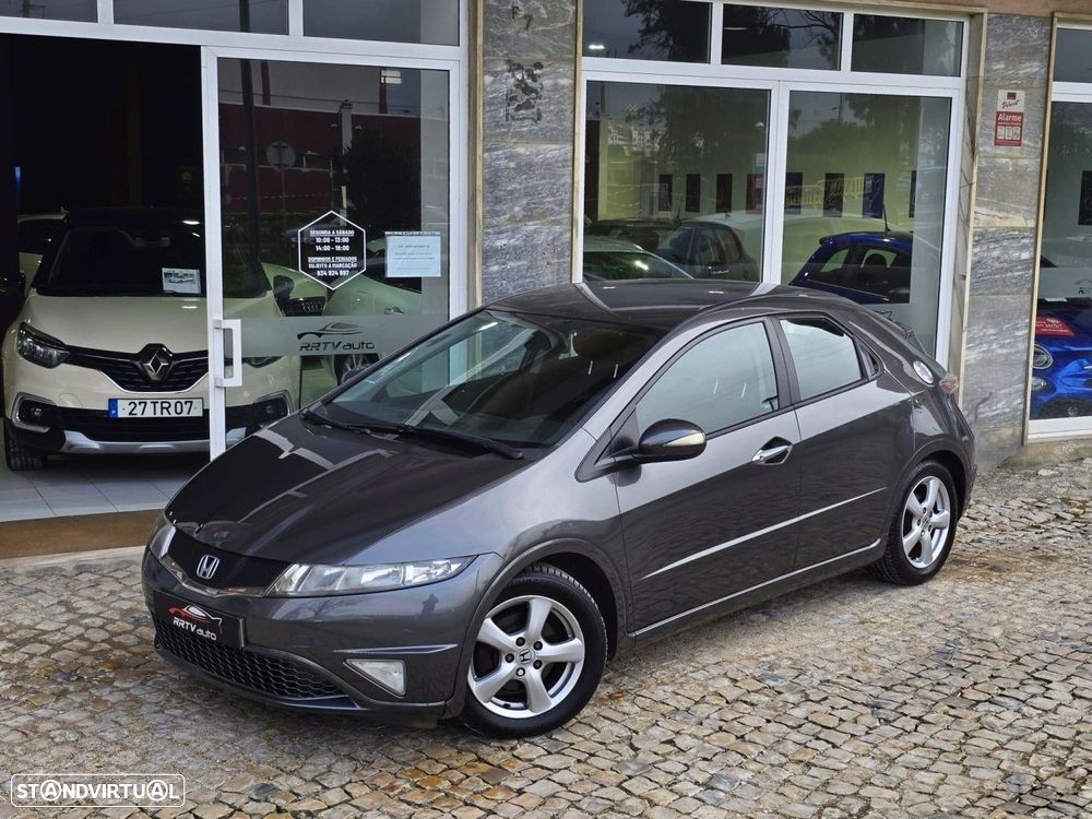 Honda Civic 1.4 i-VTEC Elegance - 1