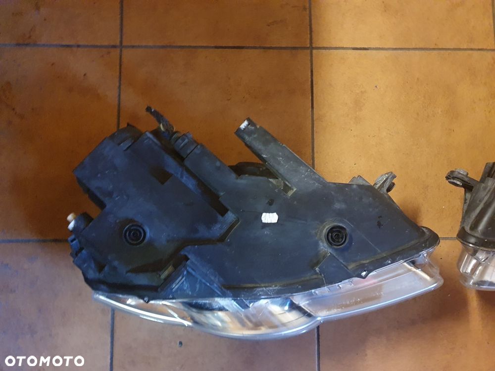 REFLEKTOR L/P VW PASSAT B6 - 8