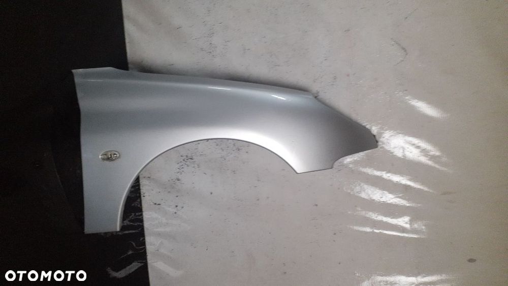 * BŁOTNIK PRAWY DO PEUGEOT 206 EZRC SREBRNY - 1