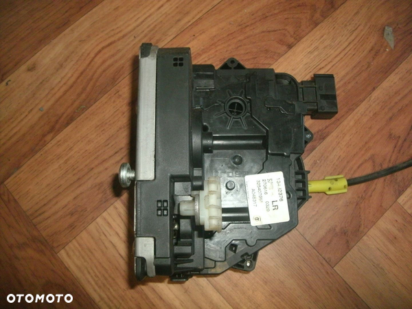 ZAMEK DRZWI OPEL MERIVA B 10-17ROK LEWY TYL 9-PIN