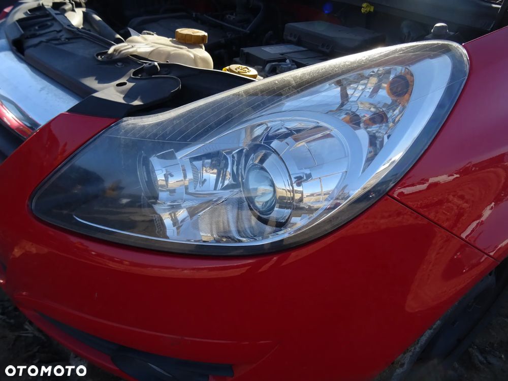Opel Corsa D lampa reflektor lewy przód soczewka skrętna - 3