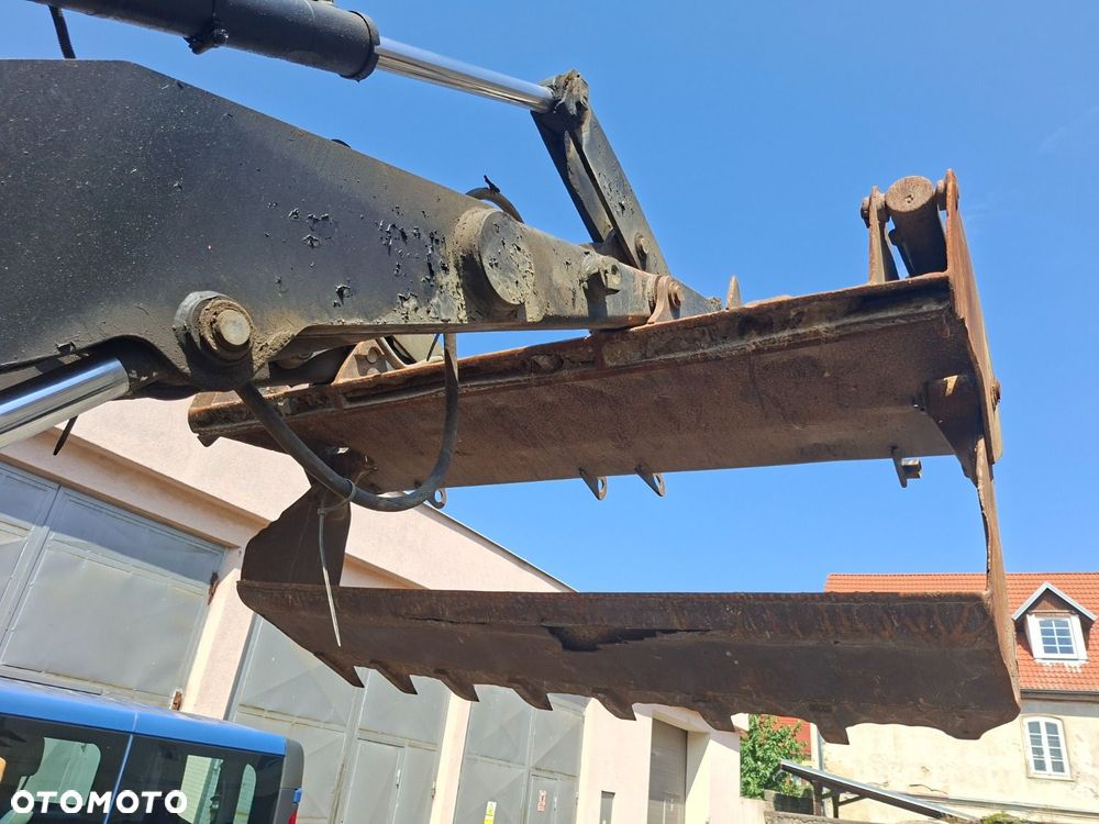 Caterpillar 428 C 4X4 - 24