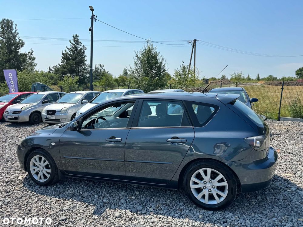Mazda 3 1.6 Exclusive + - 3