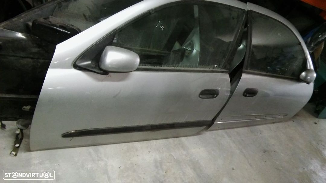 Porta condutor completa nissan almera n16 carro 3 portas - 1