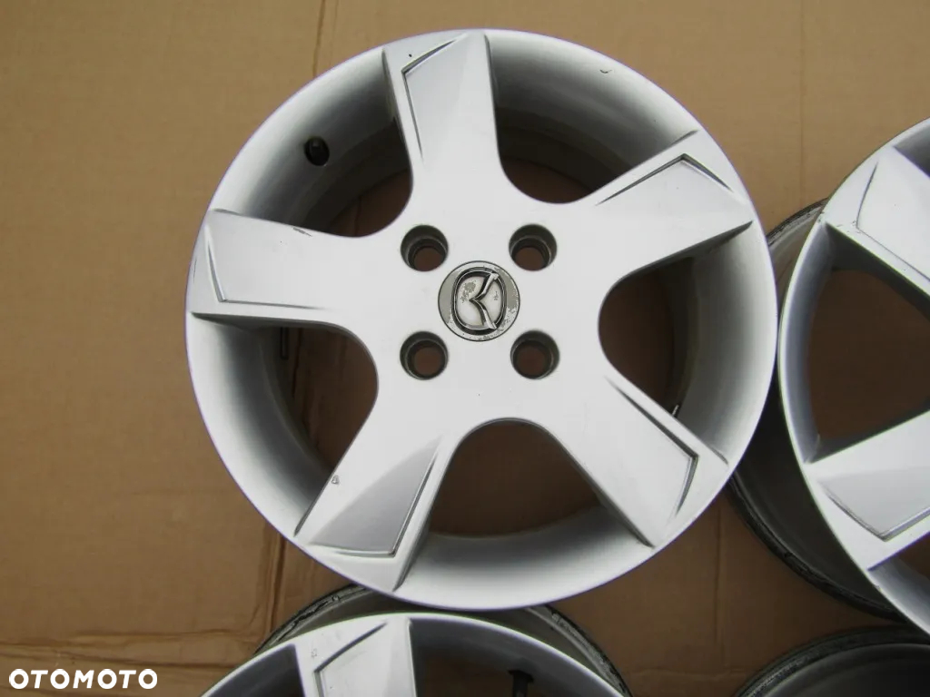 4x Felgi 15 Mazda 2 od 2003r- do 2007r / Ford Focus Fusion 6j 4x108 ET52,5 - 8