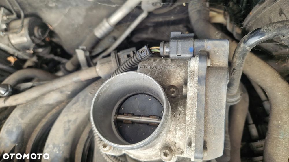 VOLKSWAGEN GOLF V 1.4 16V PRZEPUSTNICA 03C133062C - 2