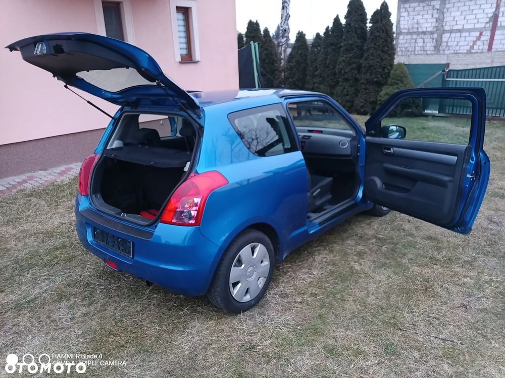 Suzuki Swift 1.3 GLX / Comfort - 31