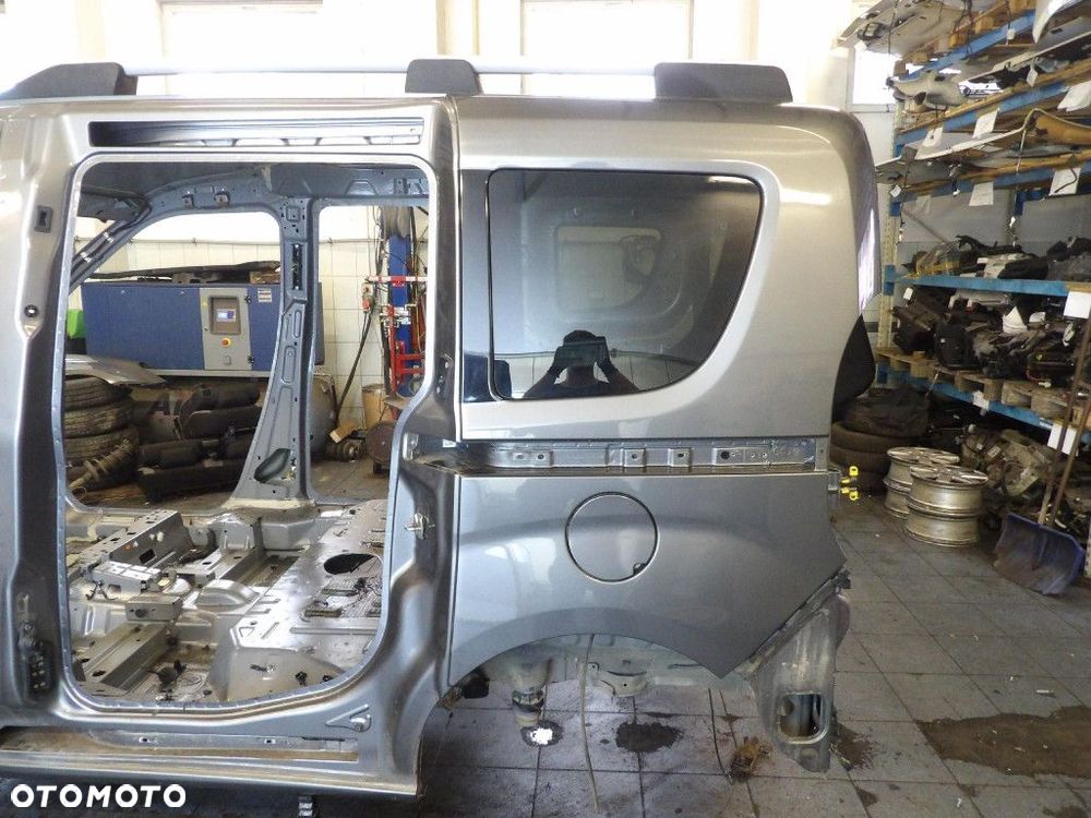 FIAT DOBLO II LIFT BŁOTNIK TYŁ LEWY - 1