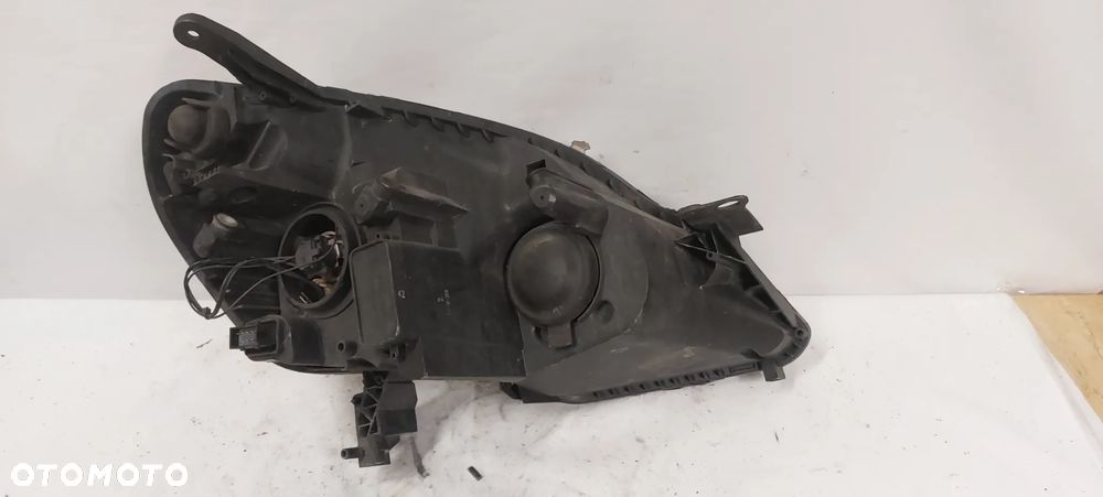 .  LAMPA PRZOD PRZEDNIA LEWA OPEL ZAFIRA B - 3