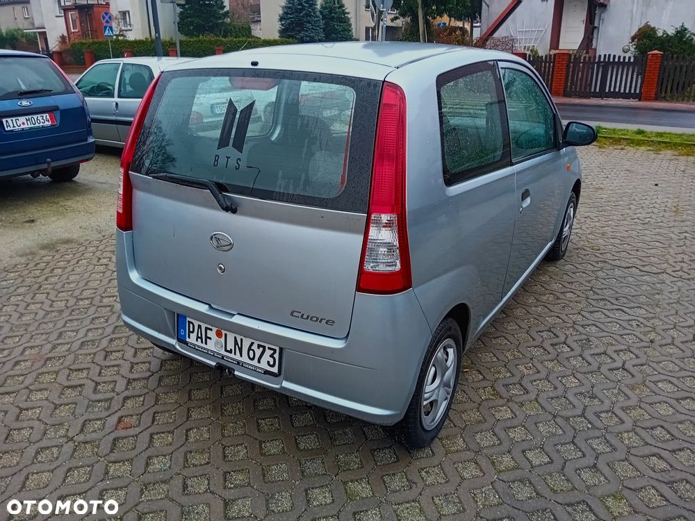Daihatsu Cuore 1.0 Top Sunshine - 6