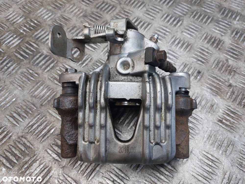 ZACISK HAMULCOWY PRAWY TYŁ VOLVO S40 II V50 I - 1