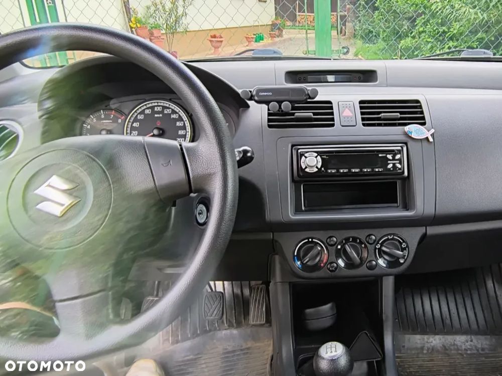 Suzuki Swift 1.3 Sakura - 8