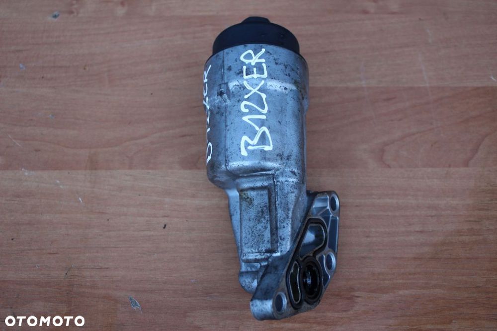 OBUDOWA FILTRA OLEJU OPEL ASTRA J MERIVA B CORSA D 1.2 1.4 A12XER A14XER 55560748