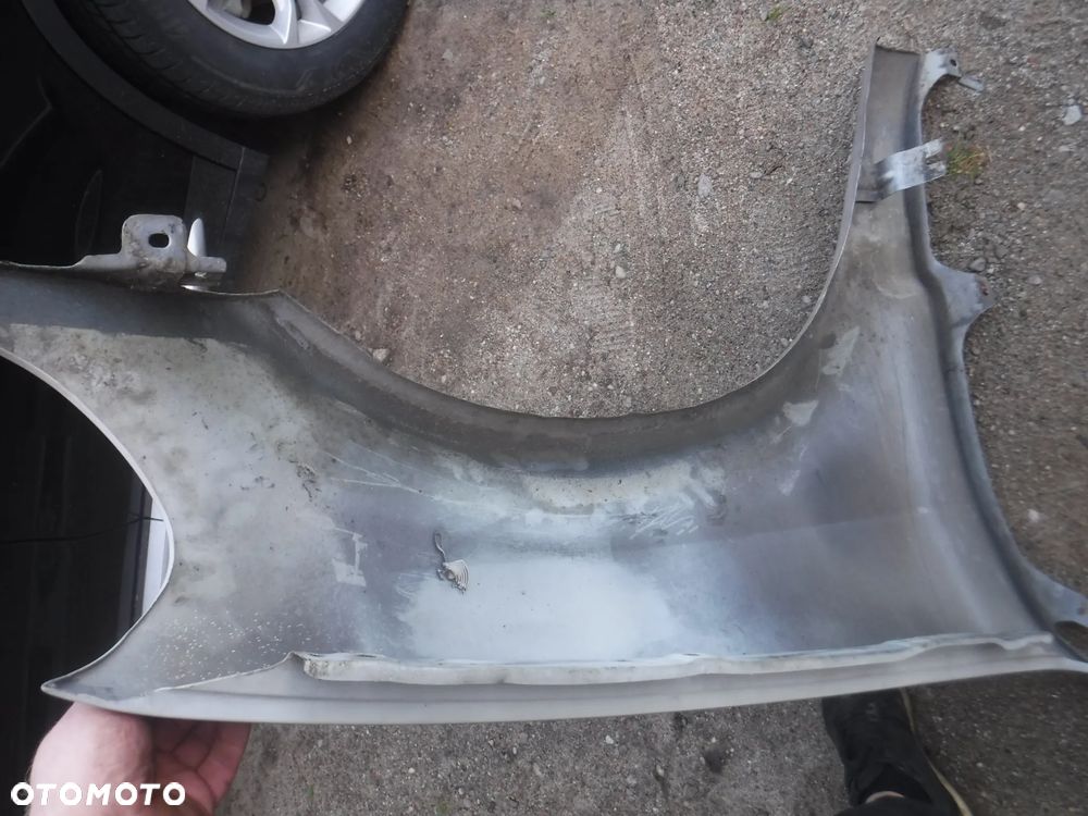 Mercedes ML FL Lift blotnik lewy  bez rdzy 693 C693 - 8