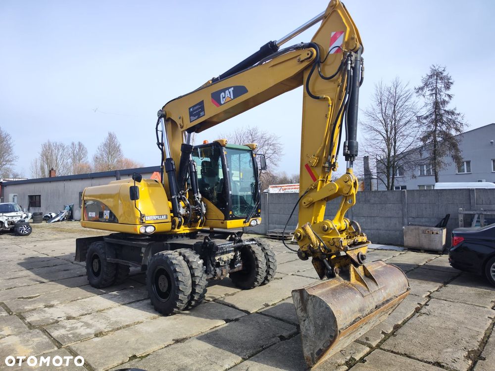 Caterpillar 318D - 11