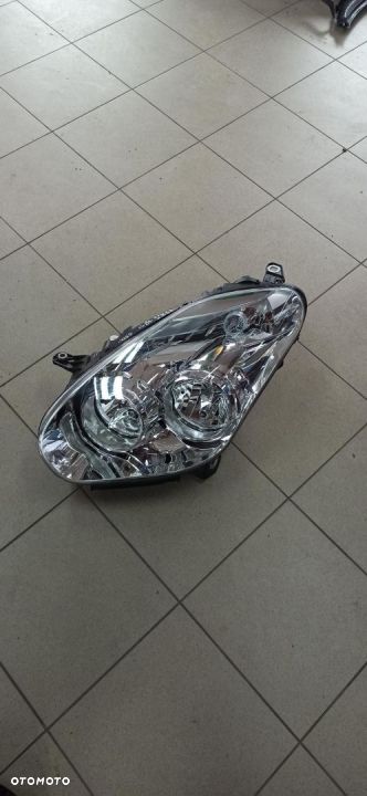 Combo Doblo 2011- reflektor lampa lewa 520868580e ori. europa b.ładny - 1