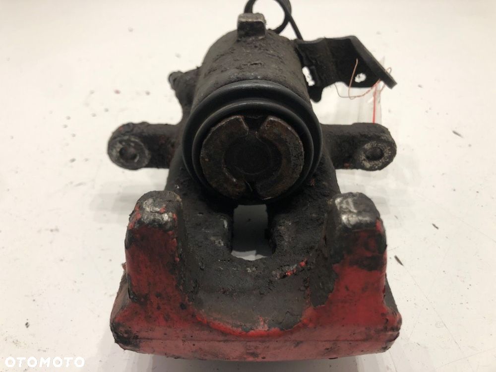 ZACISK PRAWY TYŁ  OPEL ZAFIRA B Nadwozie pełne/minivan (A05) 2005 - 2015 1.9 CDTI VAN (M75) 88 kW - 4