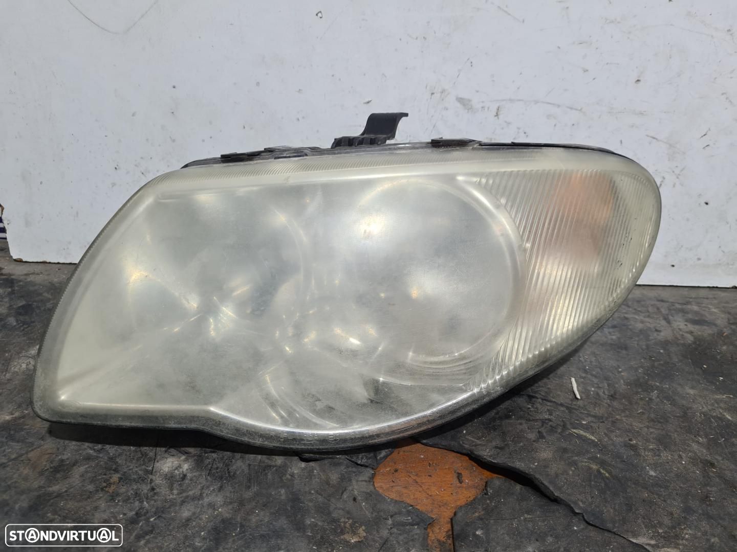 FAROL ESQUERDO CHRYSLER VOYAGER RG - 1
