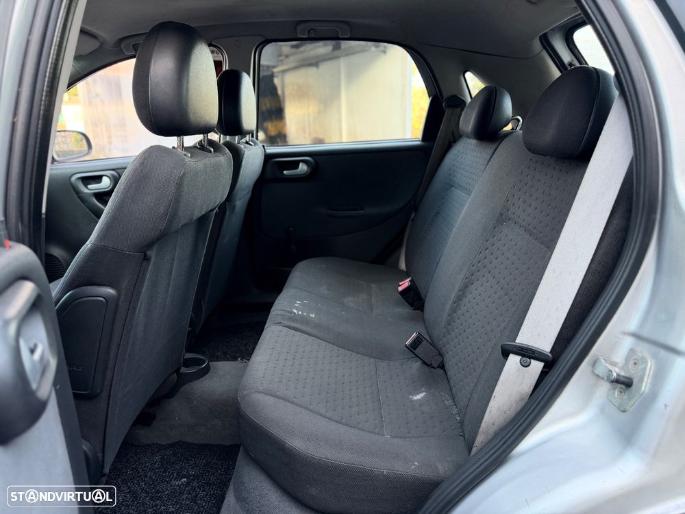 Opel Corsa 1.2 16V Enjoy - 8
