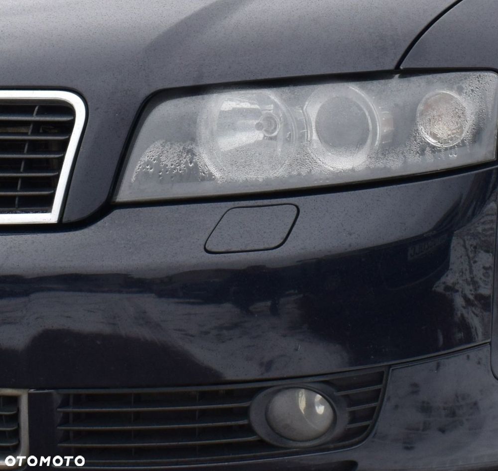 Zaślepka spryskiwacza lampy AUDI A4 B6 KOLOR L / P - 10