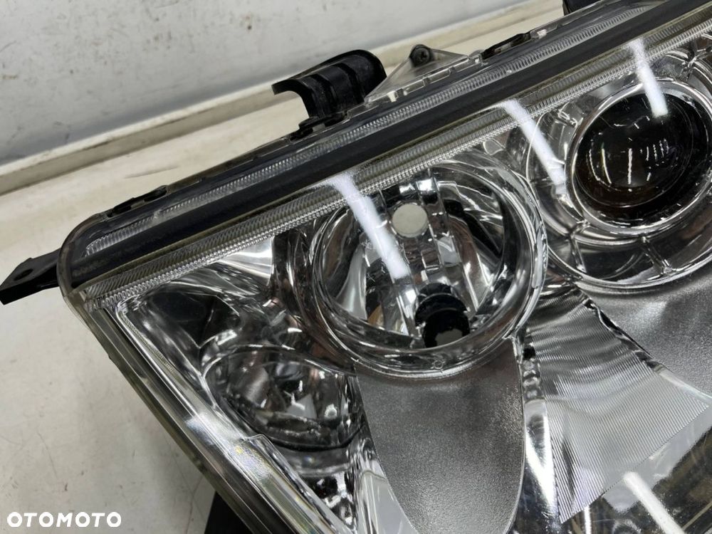 Lampa reflektor Mitsubishi L200 LIFT 10-15r. Pajero Sport II 03-16r. LEWA przednia soczewka EUROPA - 4