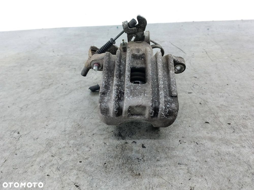 ZACISK HAMULCOWY LEWY TYŁ VW PASSAT B5 FL HART 1.9 TDI - 6