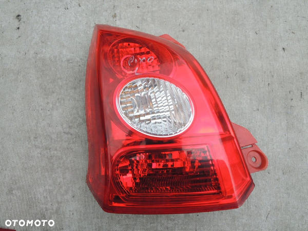 LAMPA LEWA TYŁ OE  NISSAN PIXO 09-13r