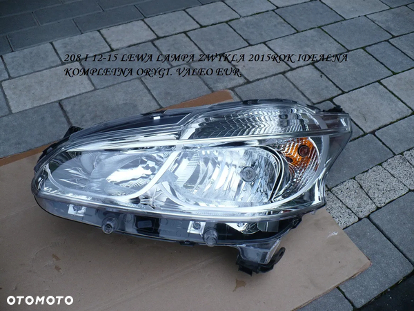 208 I 12-15 lampa lewa orygi. 9802221880 KOMPLETNA IDEALNA 15R. EUR.