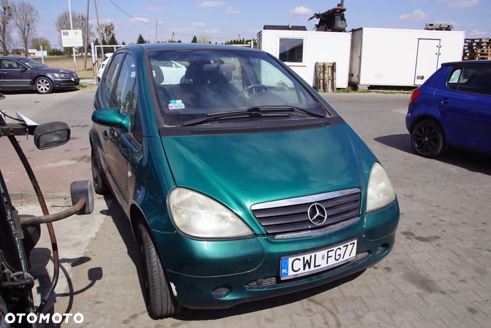 Auto na części - Mercedes A-Klasa W168 1.4 82 KM 166940 716501 282 1998R Silnik Skrzynia Drzwi Maska Błotnik Klapa Zderzak Lusterko Lampa Klamka Szyba Deska Kokpit Sterownik Moduł Czujnik Licznik Panel Kierownica - 8
