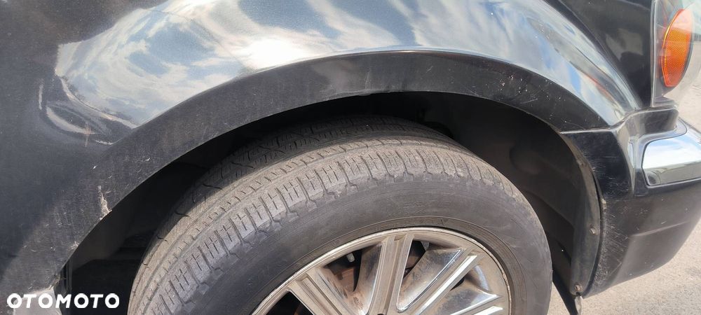 BŁOTNIK PRAWY PRZÓD CHRYSLER ASPEN 5.7 - 5