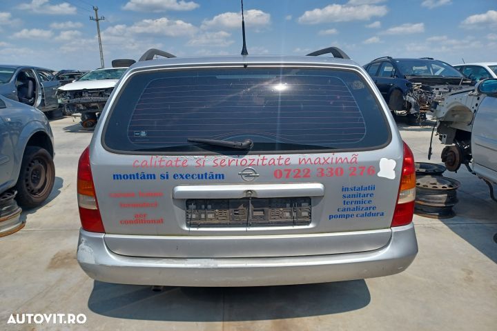 Etrier spate stanga Opel Astra G [1998 - 2009] wagon 5-usi 1.6 MT (84 - 9