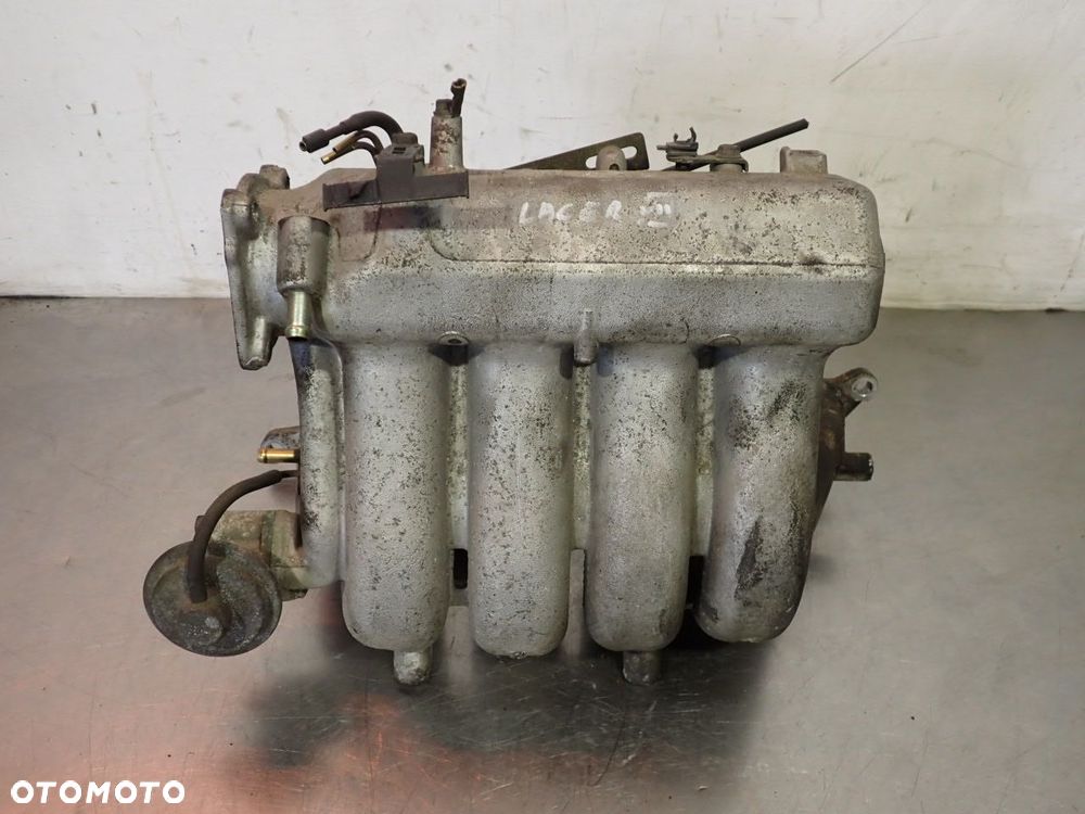 KOLEKTOR SSĄCY MITSUBISHI LANCER VII - 2