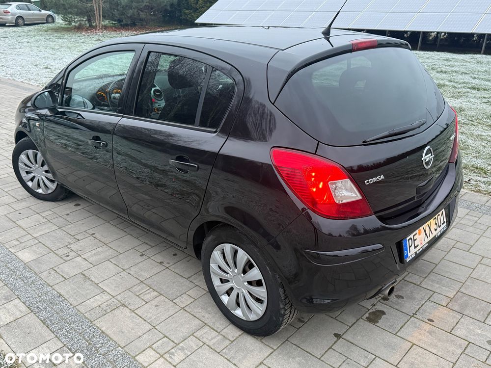 Opel Corsa 1.4 16V Enjoy - 11