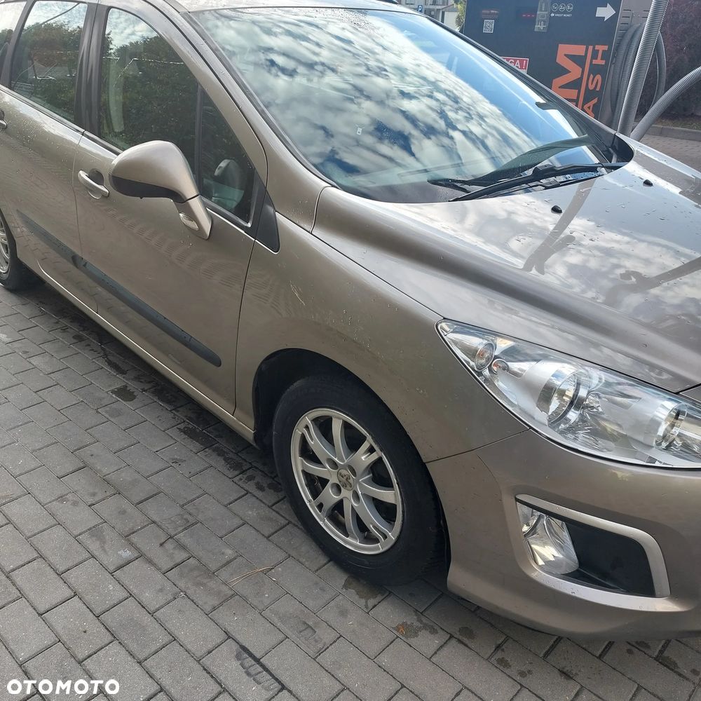 Peugeot 308 2012 photo 2