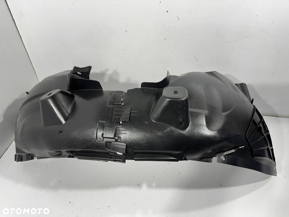Nadkole przód L  Opel Corsa D  513765057 - 1
