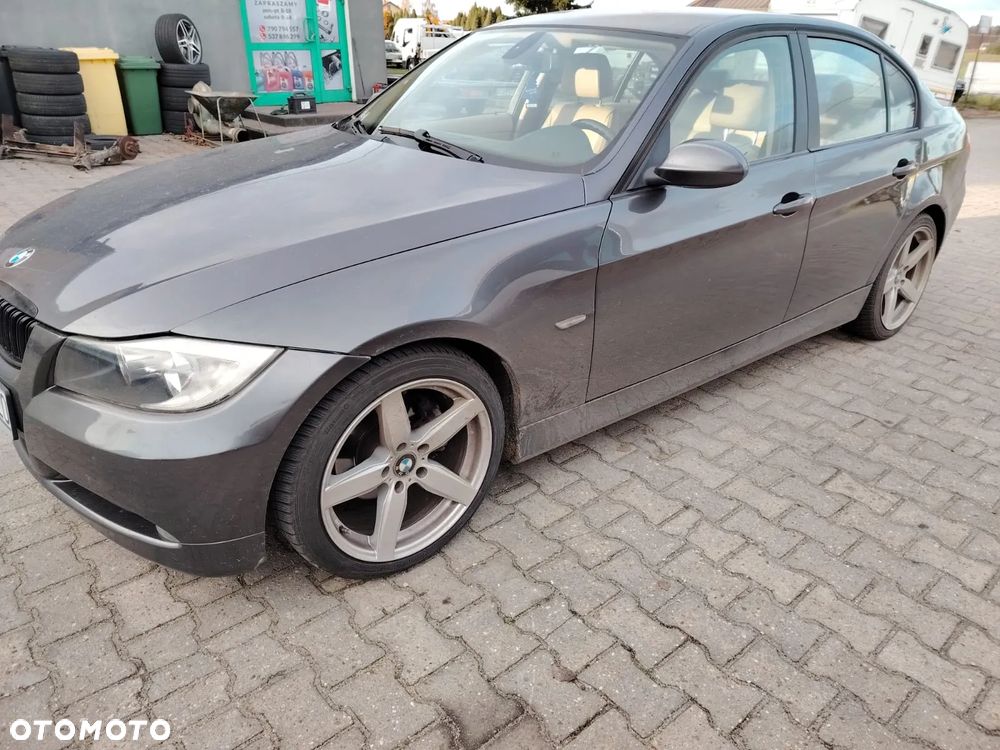 błotnik lampa cwiartka drzwi bmw e90 a22/7  części