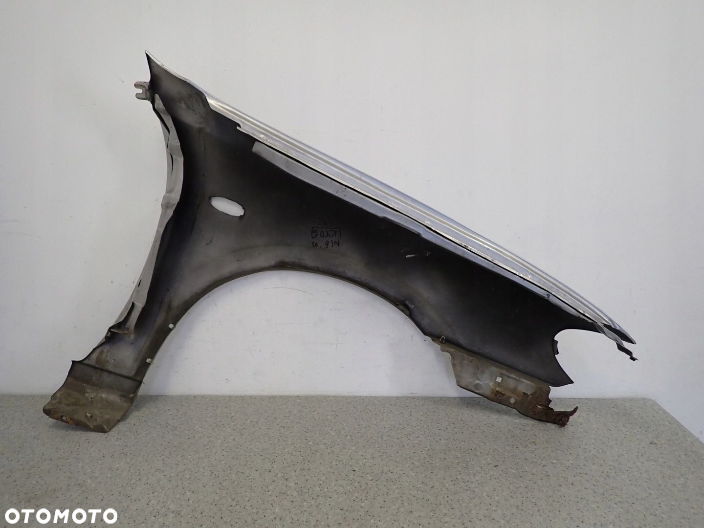 NISSAN ALMERA N16 03-06 BŁOTNIK PRZEDNI LEWY KY0 - 10