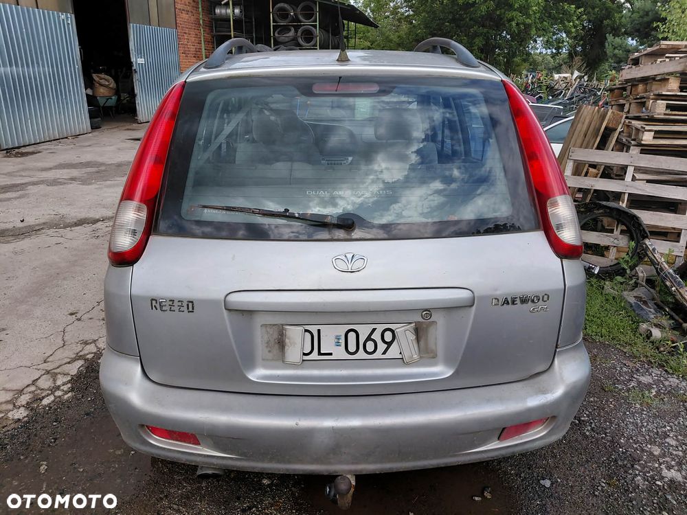 części DAEWOO REZZO 2004r. 2.0 16V benzyna 89kw ZDERZAK TYŁ 92U - 1