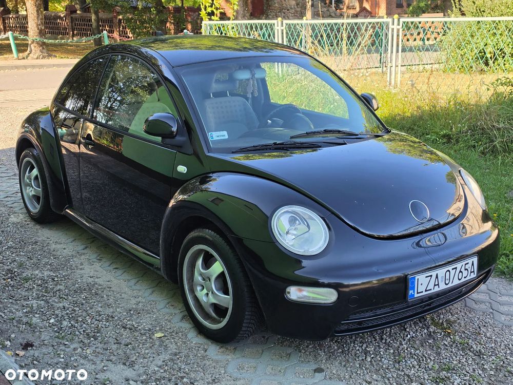 Volkswagen New Beetle 2.0 - 4