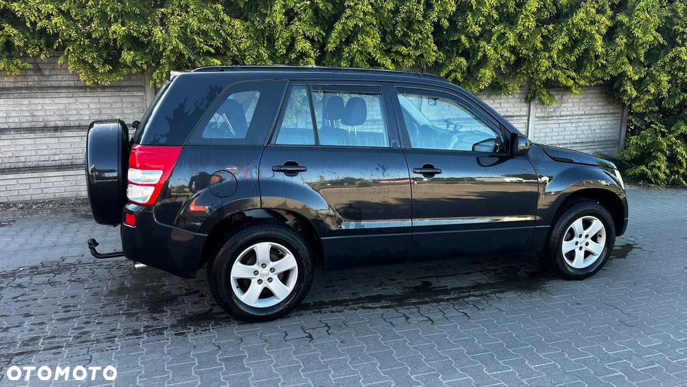 Suzuki Grand Vitara 2.0 Comfort + - 6