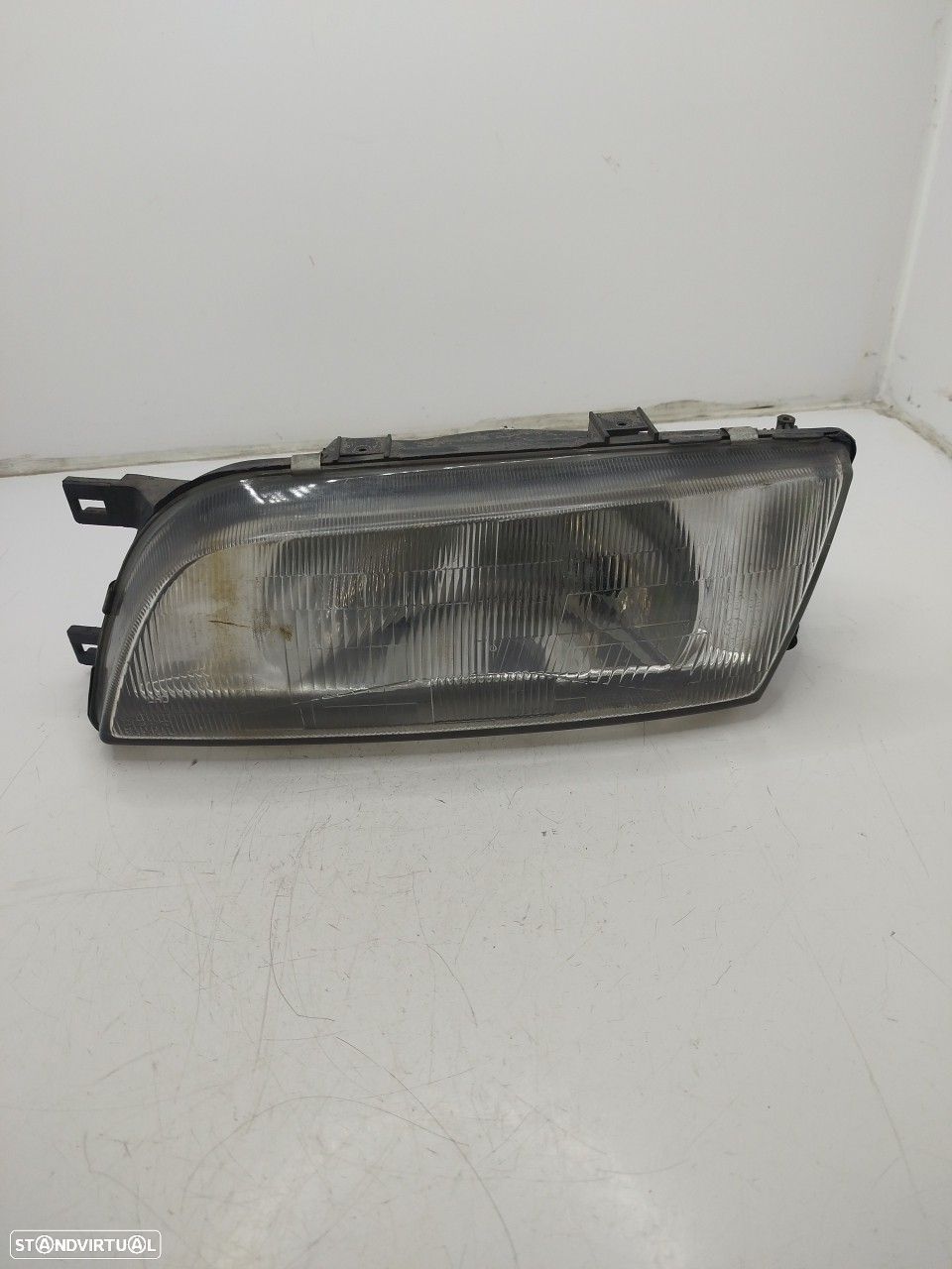 Farol/ Otica Dianteiro Esq Nissan Almera I Hatchback (N15) - 1
