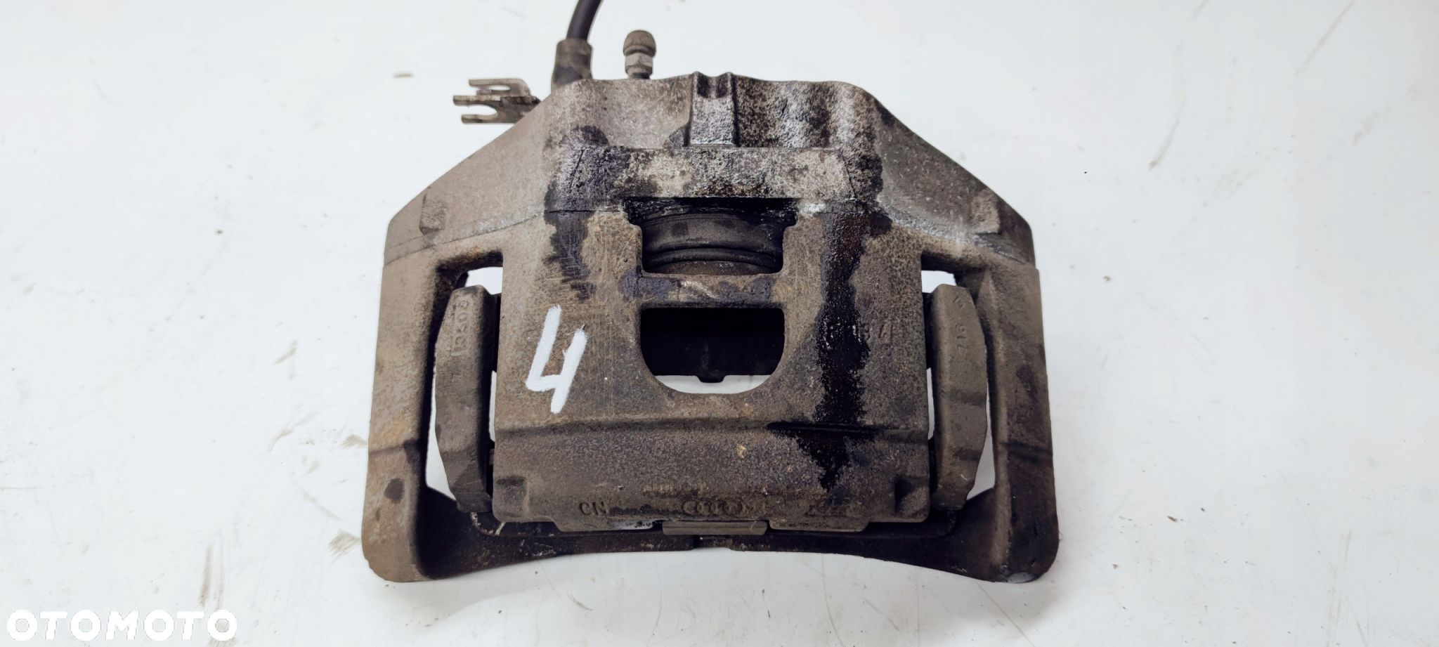 ZACISK HAMULCOWY JARZMO LEWY AUDI A6 C6 973 320MM - 1