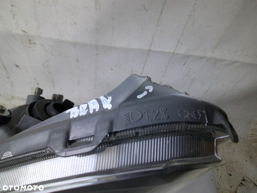 toyota yaris verso lampa przód lewa przednia nowa oryg - 6