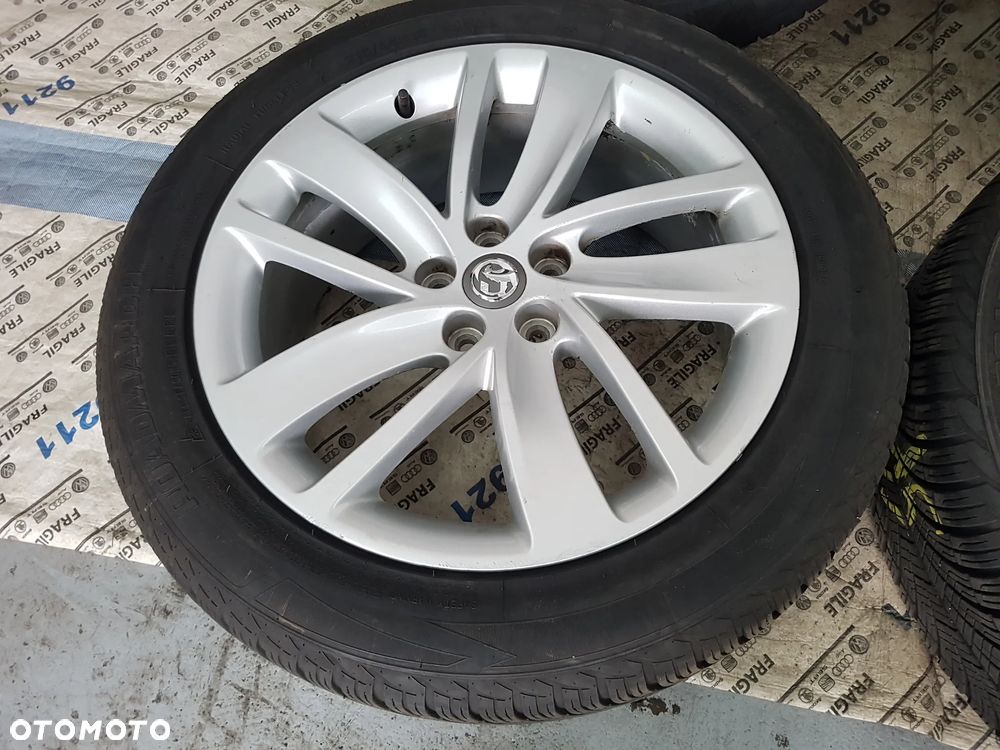 KOŁA CAŁOROCZNE OPEL MOKKA TRAX  5X105  7JX18  215/55R18  215/55/18 - 14