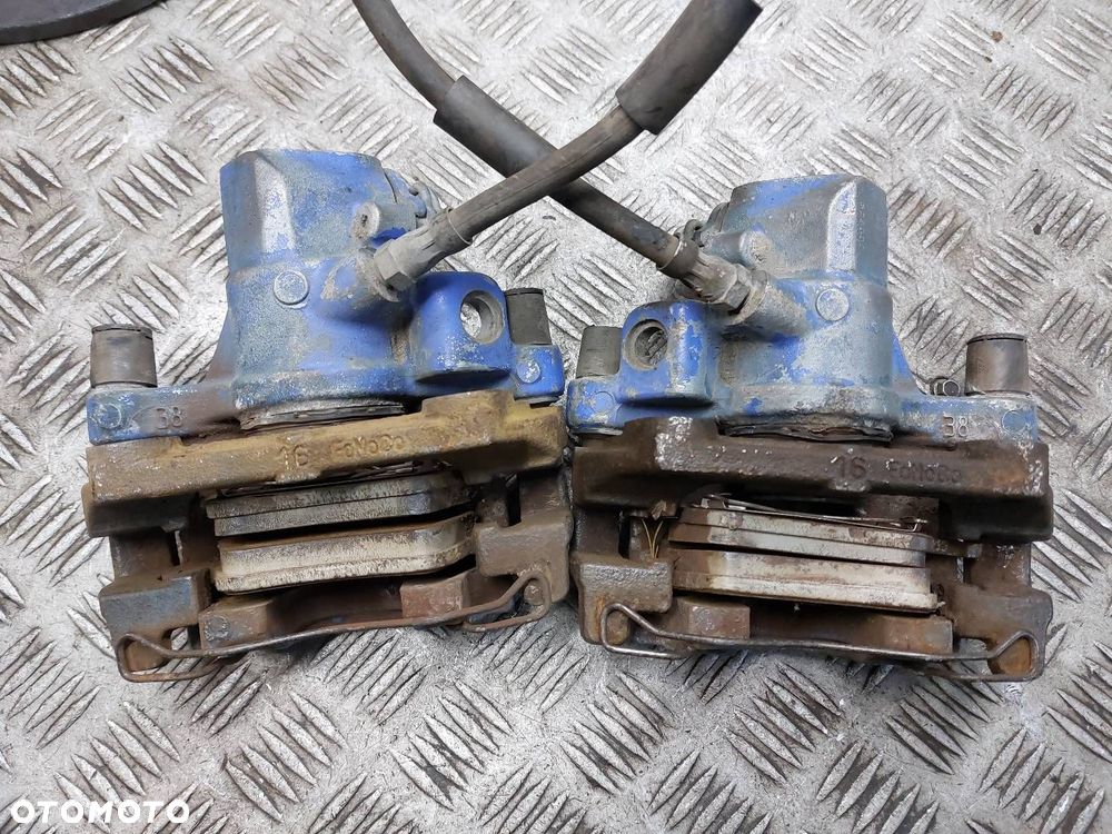 TARCZE HAMULCOWE TYŁ + KLOCKI + ZACISKI VOLVO S40 II V50 - 4