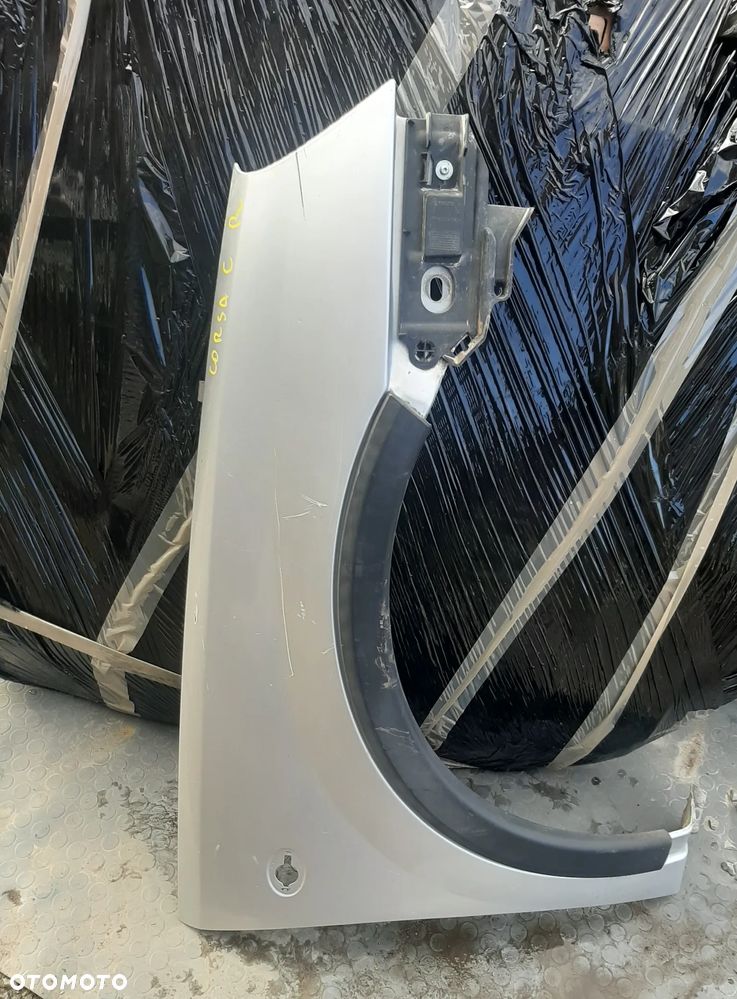 Błotnik OPEL CORSA C prawy lewy OE - 4