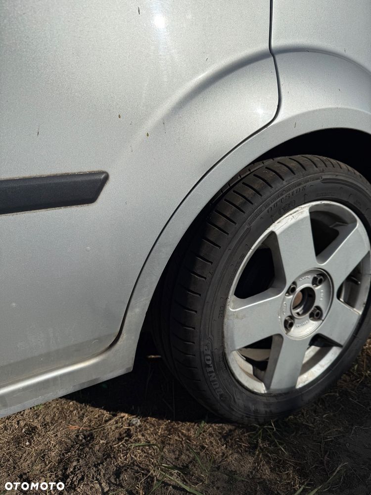 Ford Fiesta 1.4 Ghia - 10