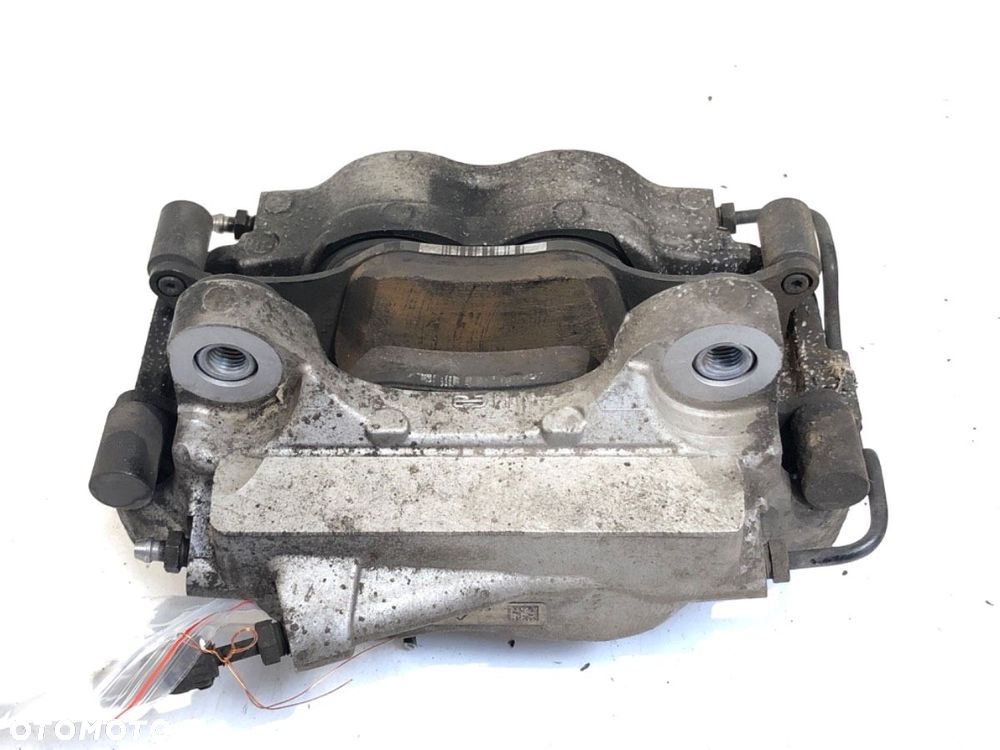 ZACISK LEWY PRZÓD  BMW 5 (G30, F90) 2016 - 2022 530 e Plug-in-Hybrid 135 kW [184 KM] Hybryda silnik - 3